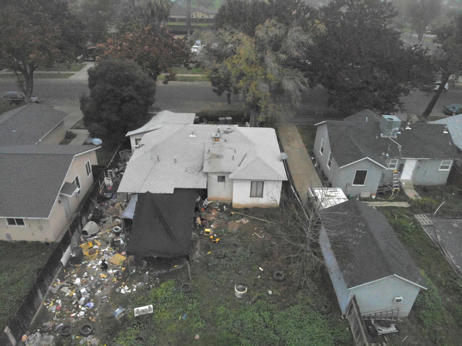 832 West 9th Street Merced, CA 95341 - Photo 1 of 44 an aerial view of a house with a yard
