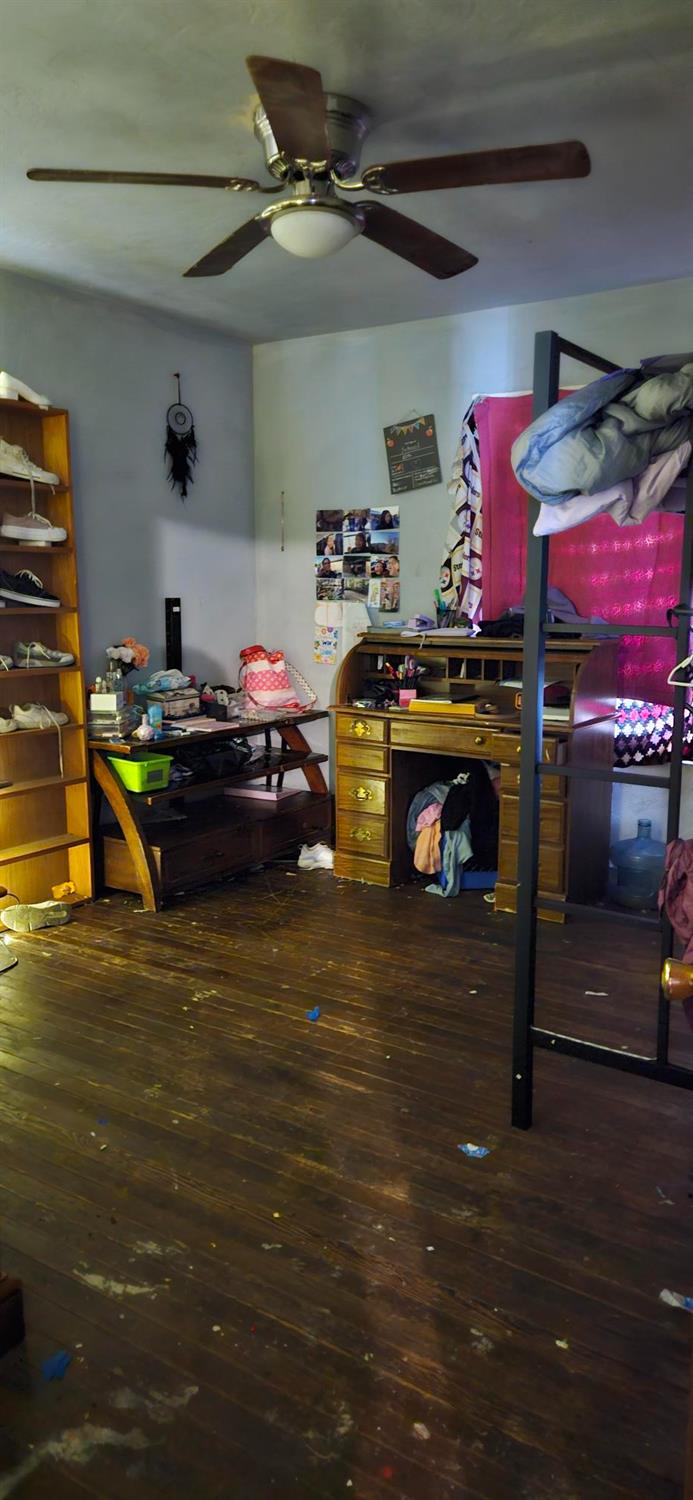 832 West 9th Street Merced, CA 95341 - Photo 11 of 44 a room with storage and utility