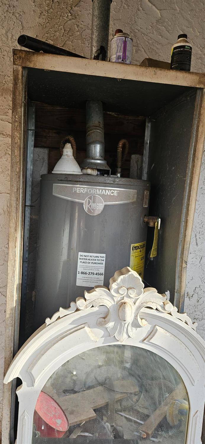 832 West 9th Street Merced, CA 95341 - Photo 17 of 44 a bedroom with a bed and a cabinet