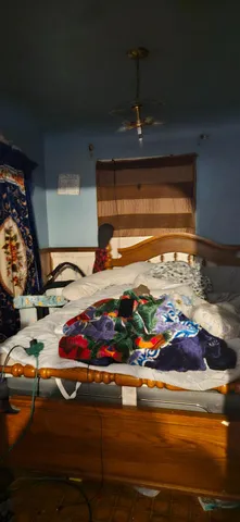 a room with lots of different colored cloths