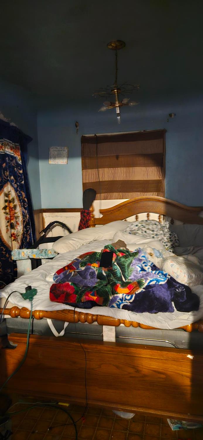 832 West 9th Street Merced, CA 95341 - Photo 3 of 44 a room with lots of different colored cloths