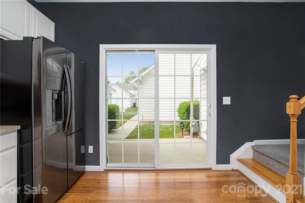1104 Drummond Lane Matthews, NC 28104 - Photo 11 of 20 a room with a large window and walk in closet