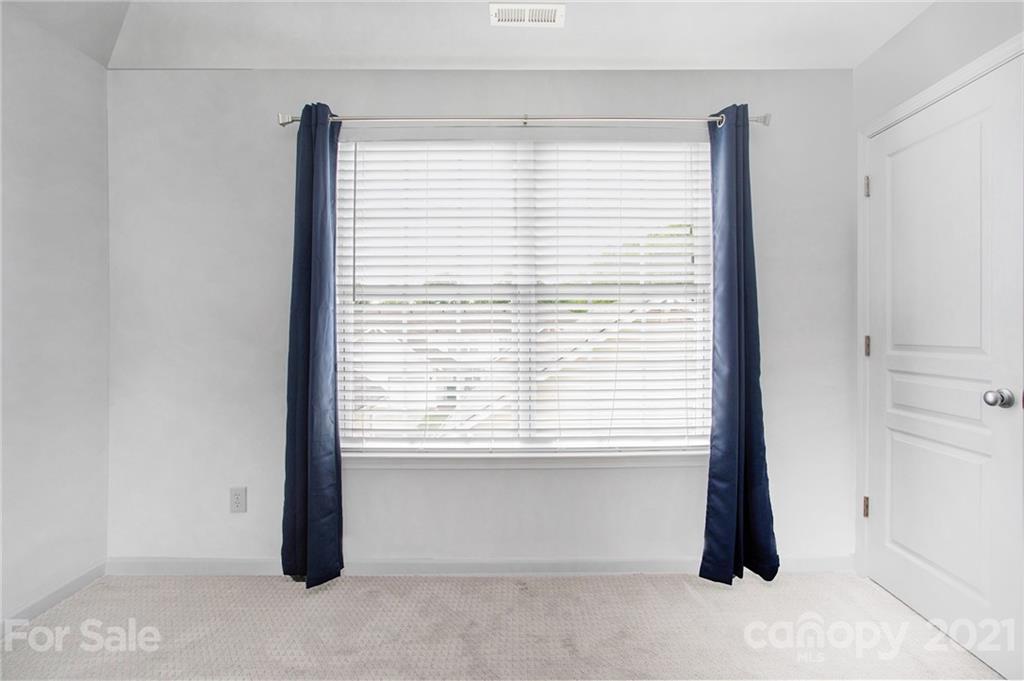 1104 Drummond Lane Matthews, NC 28104 - Photo 18 of 20 a view of a room that has a window
