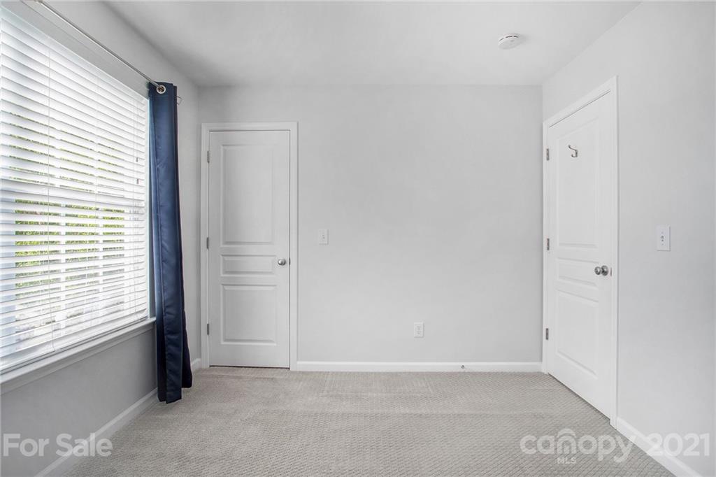 1104 Drummond Lane Matthews, NC 28104 - Photo 19 of 20 an empty room with windows
