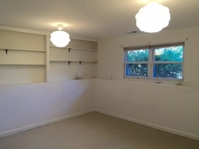 an empty room with a window