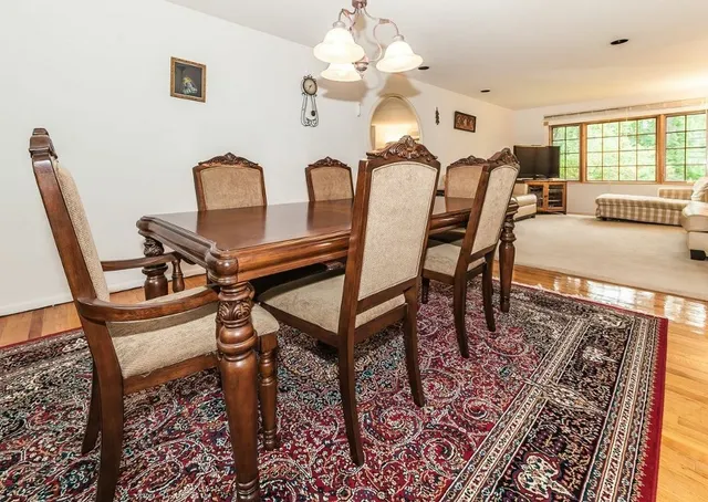 a view of a dining room with furniture