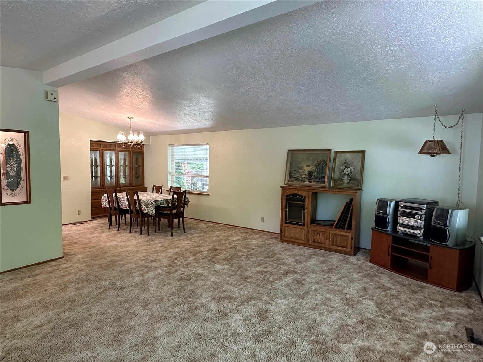 2283 Rincon Avenue, Unit 92 Enumclaw, WA 98022 - Photo 11 of 25 a view of a livingroom with furniture and a kitchen