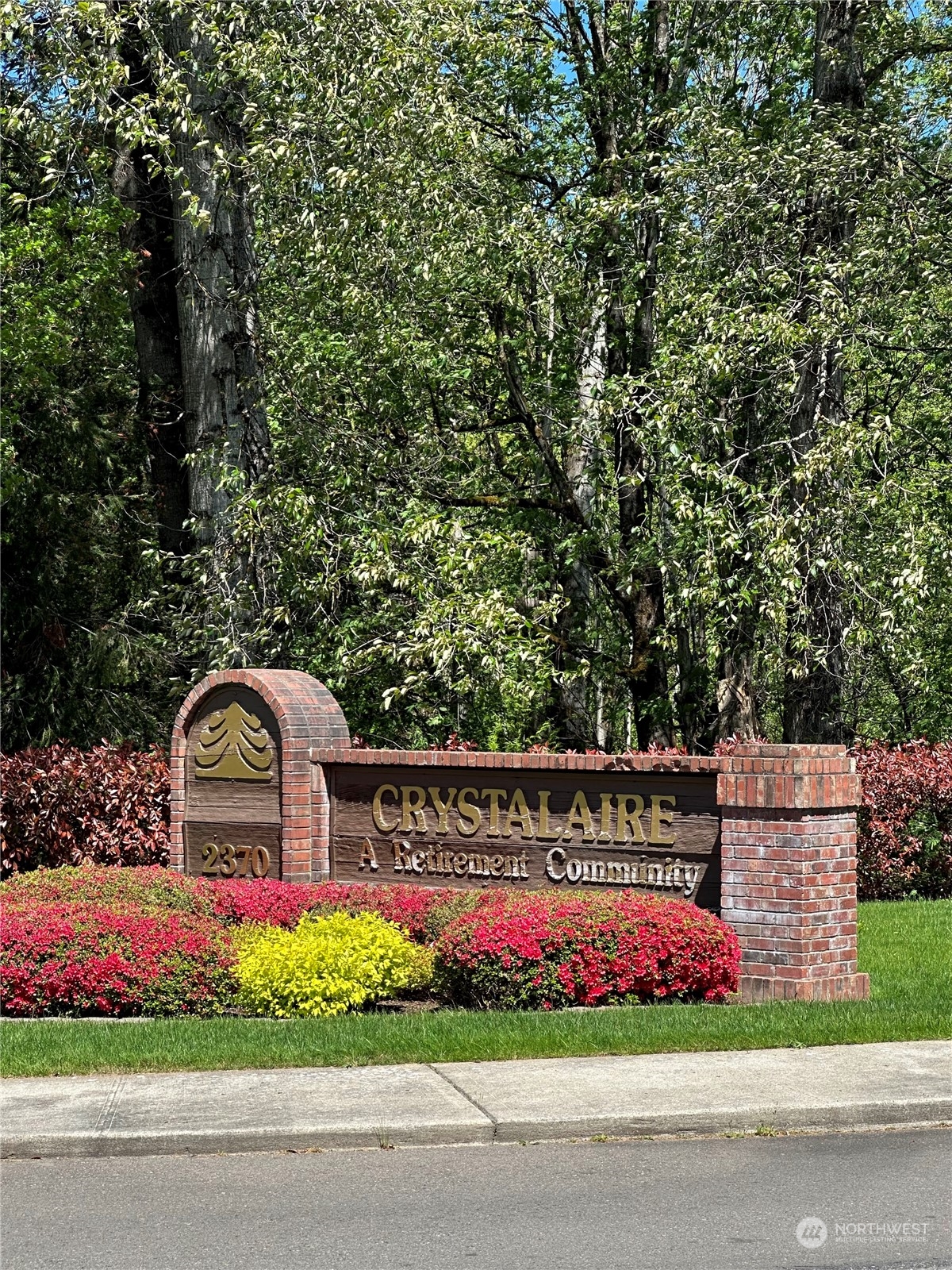 2283 Rincon Avenue, Unit 92 Enumclaw, WA 98022 - Photo 2 of 25 a front view of a house with garden