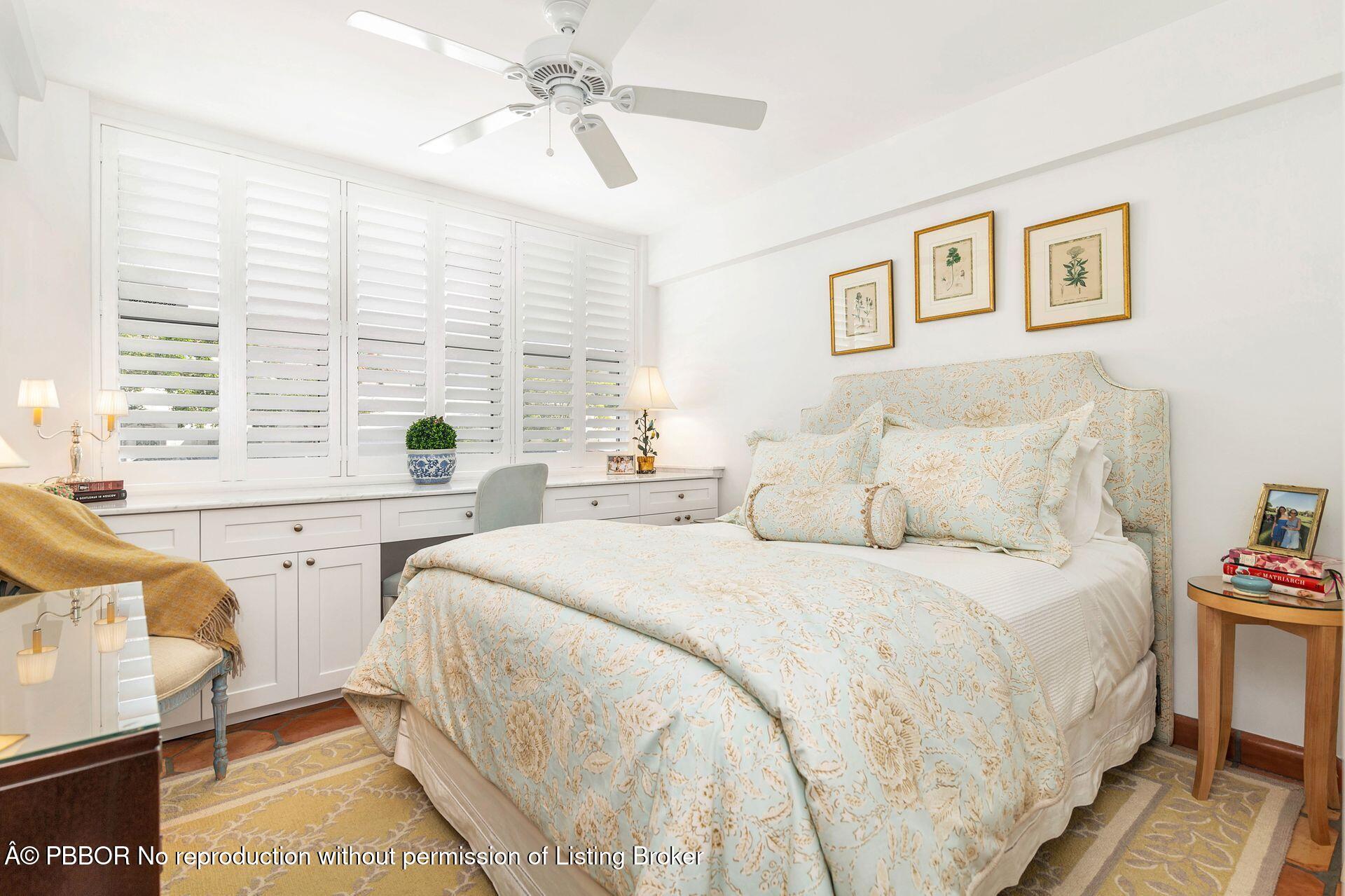 401 Peruvian Avenue, Unit 1040 Palm Beach, FL 33480 - Photo 10 of 17 a bedroom with a bed and a large window
