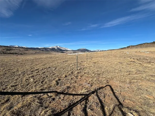 a view of ocean with a beach