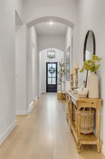 a view of an entryway with front door