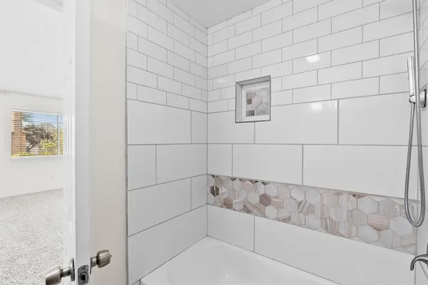 a bathroom with a bathtub
