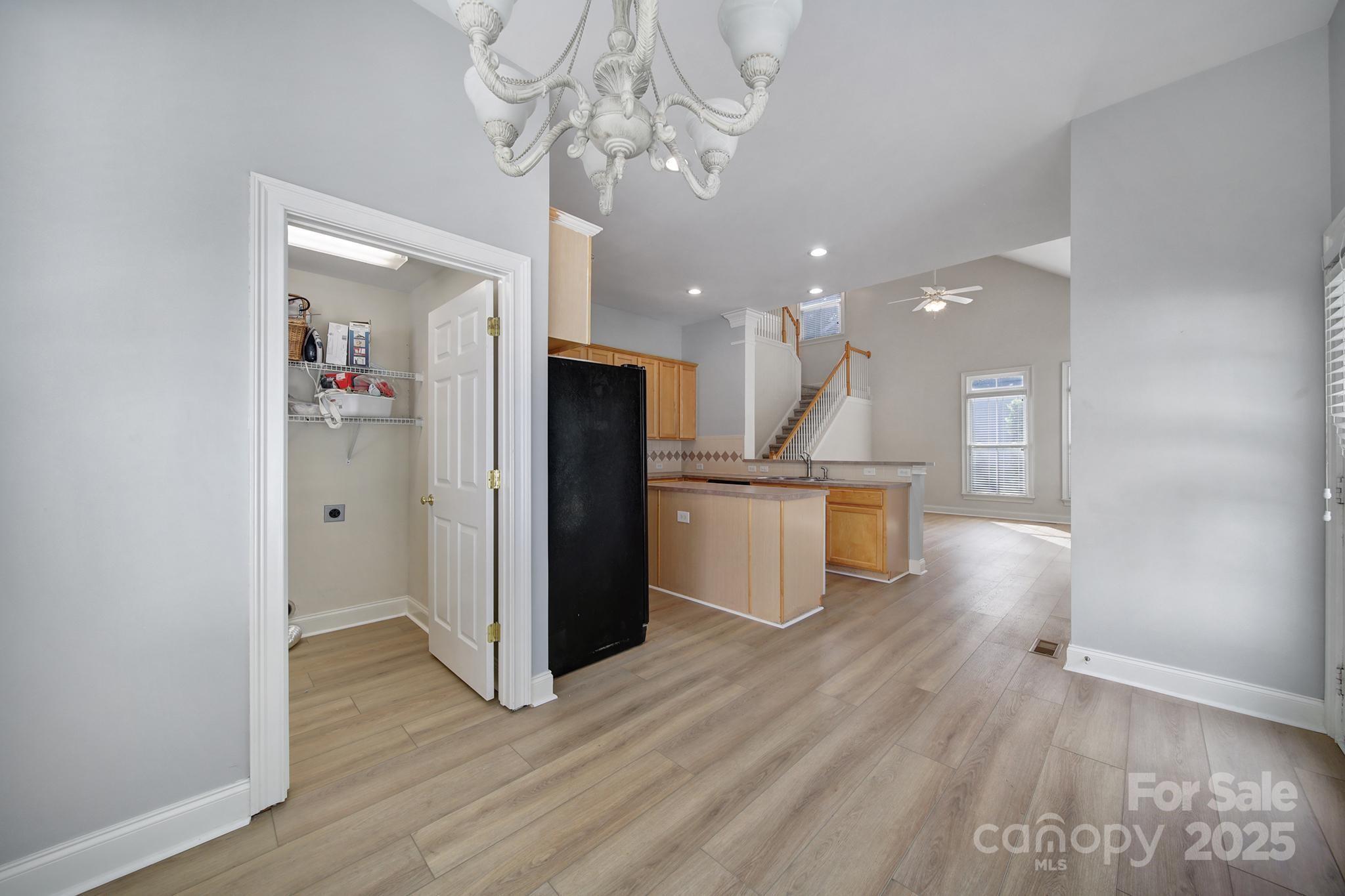 2612 Nations Commons Street Fort Mill, SC 29708 - Photo 28 of 48 a view of kitchen with cabinets and wooden floor