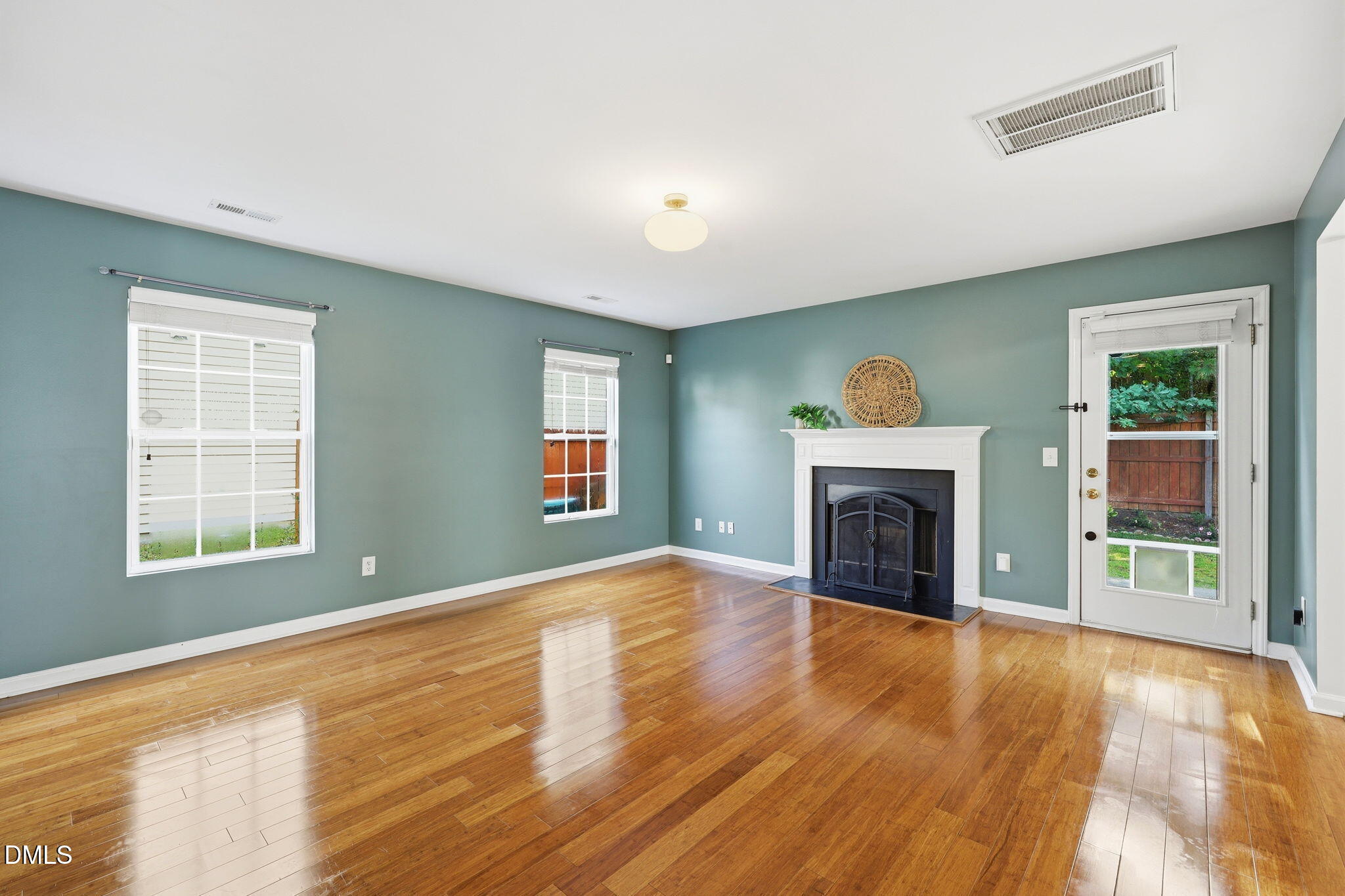 4232 Dalcross Road Raleigh, NC 27610 - Photo 5 of 42 a view of an empty room with window and fire place