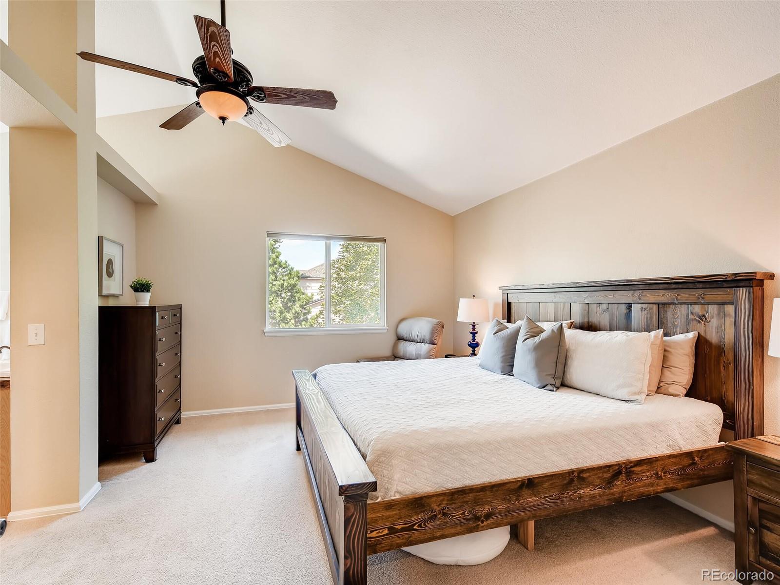 2373 Hyacinth Road Highlands Ranch, CO 80129 - Photo 12 of 38 a bedroom with a bed and window