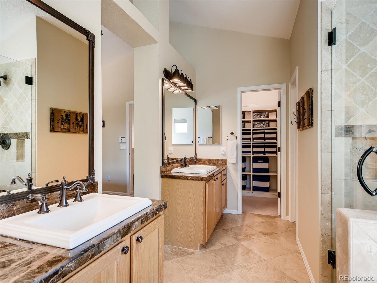 2373 Hyacinth Road Highlands Ranch, CO 80129 - Photo 14 of 38 a kitchen with a stove a refrigerator and a stove