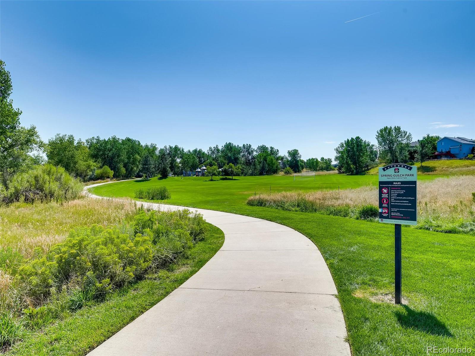 2373 Hyacinth Road Highlands Ranch, CO 80129 - Photo 34 of 38 a view of a park with large trees