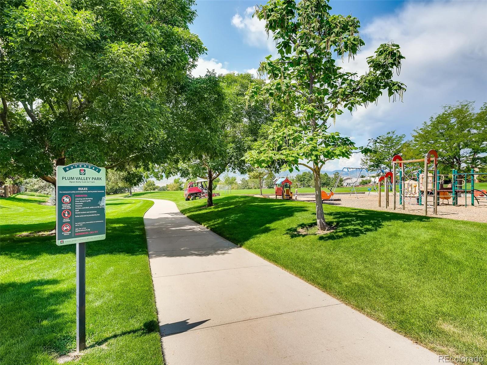 2373 Hyacinth Road Highlands Ranch, CO 80129 - Photo 37 of 38 a view of a park with plants and large trees