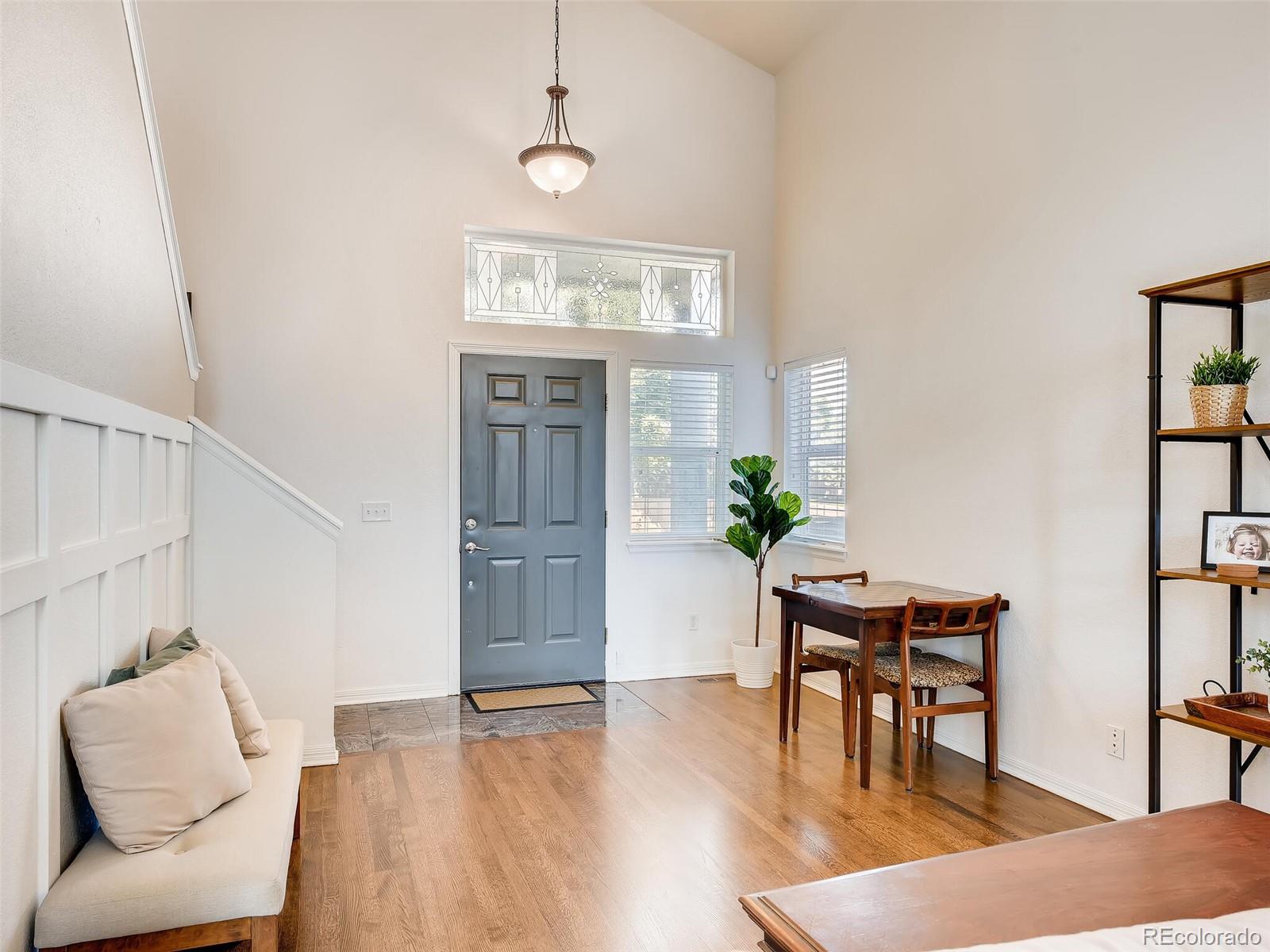 2373 Hyacinth Road Highlands Ranch, CO 80129 - Photo 8 of 38 a workspace with furniture window and wooden floor