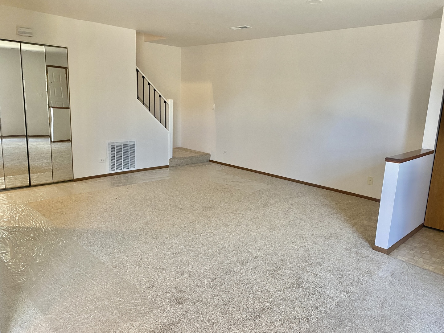 404 St Johns Road, Unit C Woodstock, IL 60098 - Photo 4 of 19 a view of an empty room