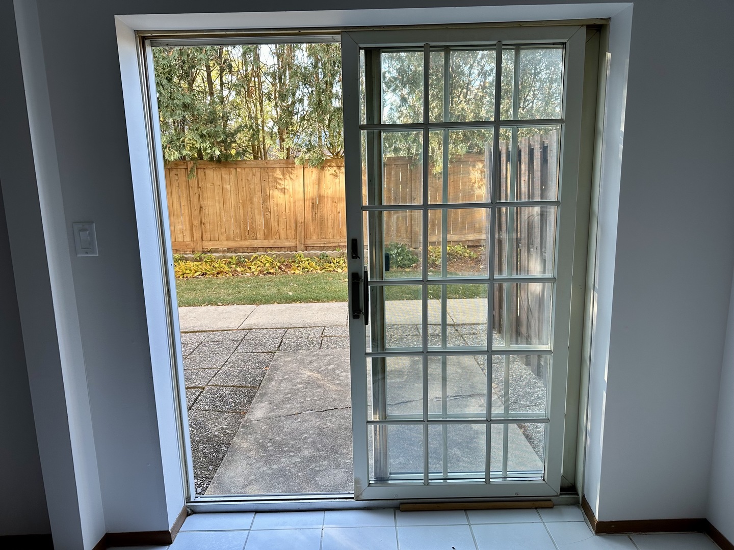404 St Johns Road, Unit C Woodstock, IL 60098 - Photo 10 of 19 a view of a room that has a large window
