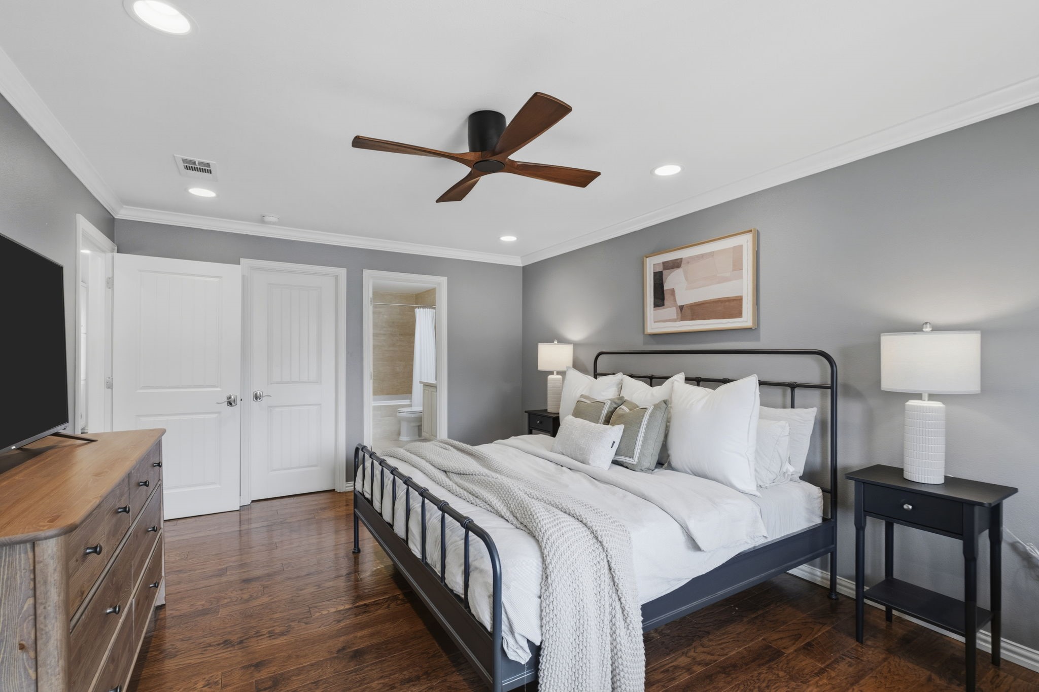 4733 Carleen Road Houston, TX 77092 - Photo 12 of 22 Privately positioned, the primary bedroom makes for a quiet retreat.