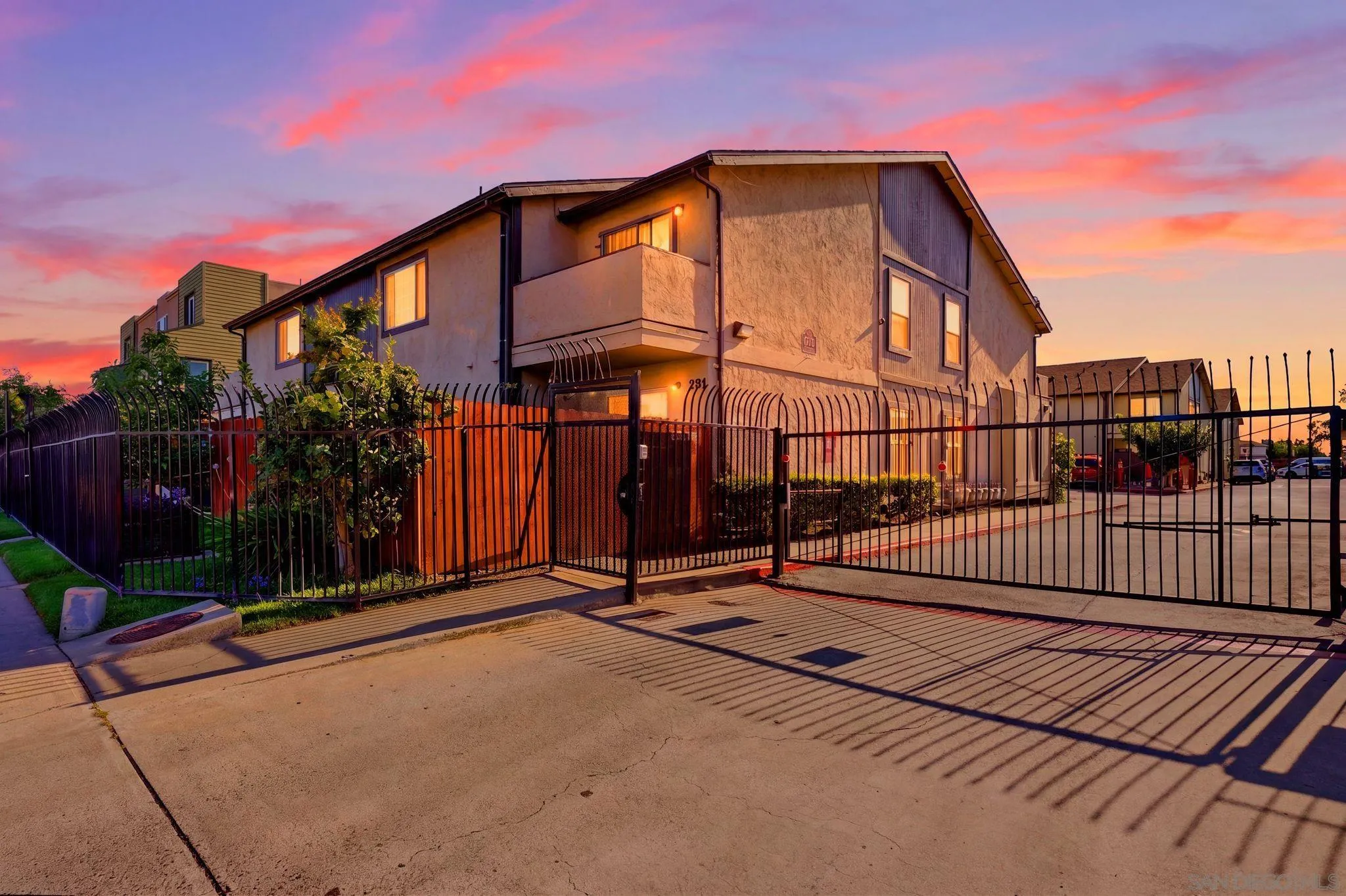 293 Sycamore Road, Unit 15 San Ysidro, CA 92173 - Photo 1 of 25 a front view of a house with iron fence