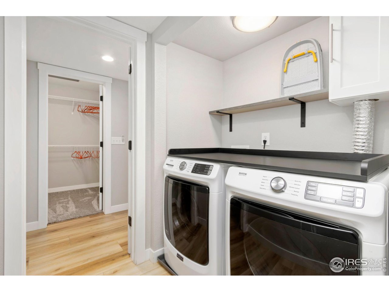 3002 West Elizabeth Street, Unit F Fort Collins, CO 80521 - Photo 7 of 18 a view of washer and dryer