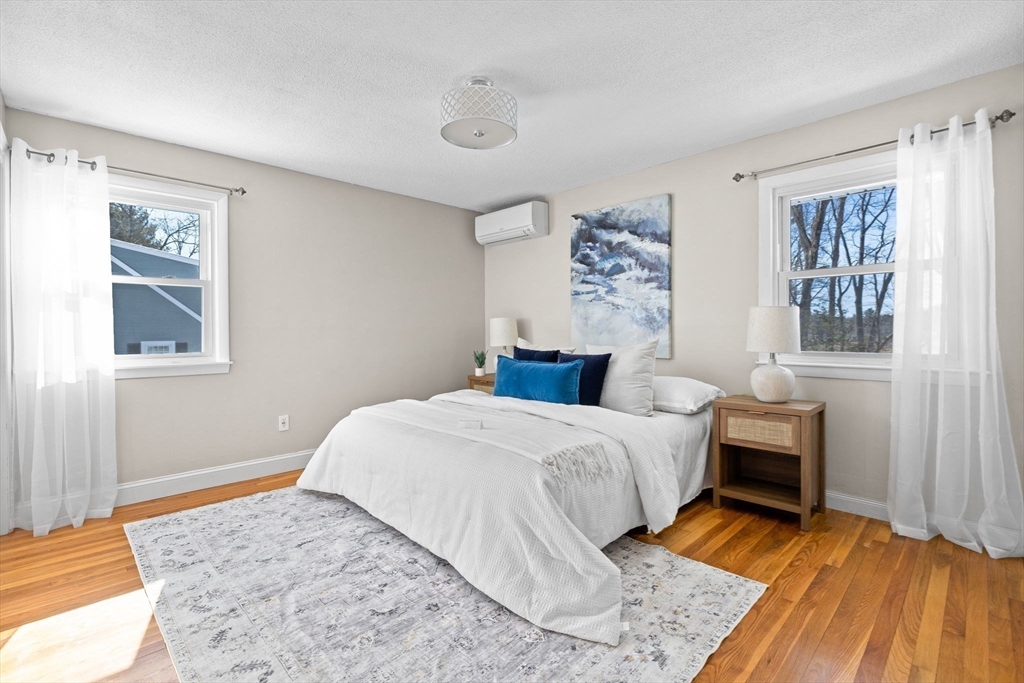 7 Dean Circle Andover, MA 01810 - Photo 14 of 36 a bedroom with a bed and a window