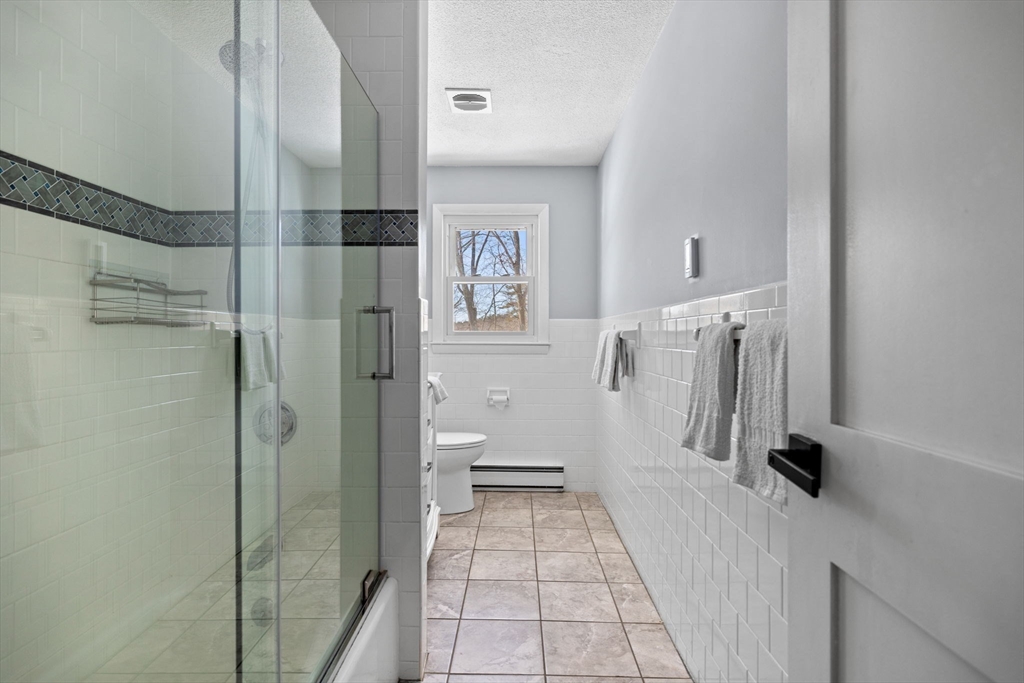7 Dean Circle Andover, MA 01810 - Photo 23 of 36 a bathroom with a shower