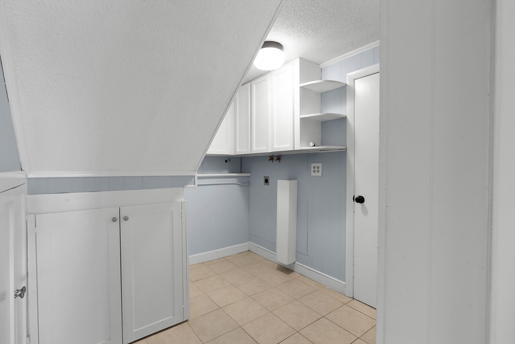 7 Dean Circle Andover, MA 01810 - Photo 33 of 36 a view of an empty walk in closet