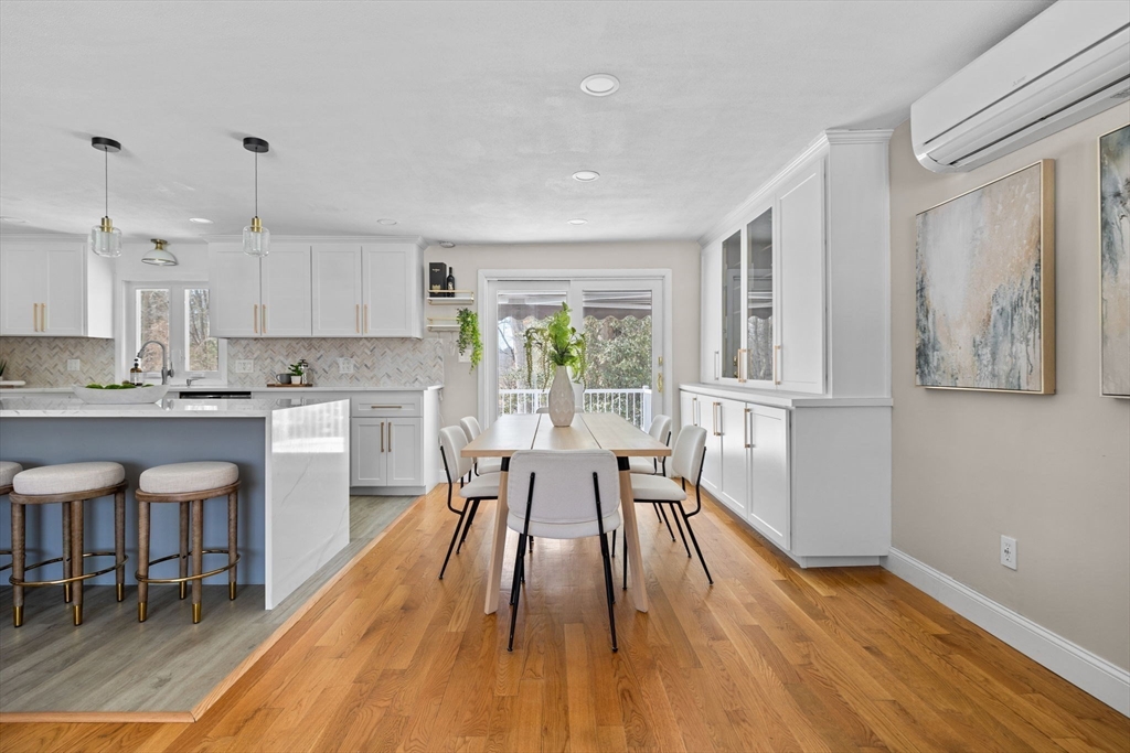 7 Dean Circle Andover, MA 01810 - Photo 9 of 36 a view of a dining room with furniture window and wooden floor