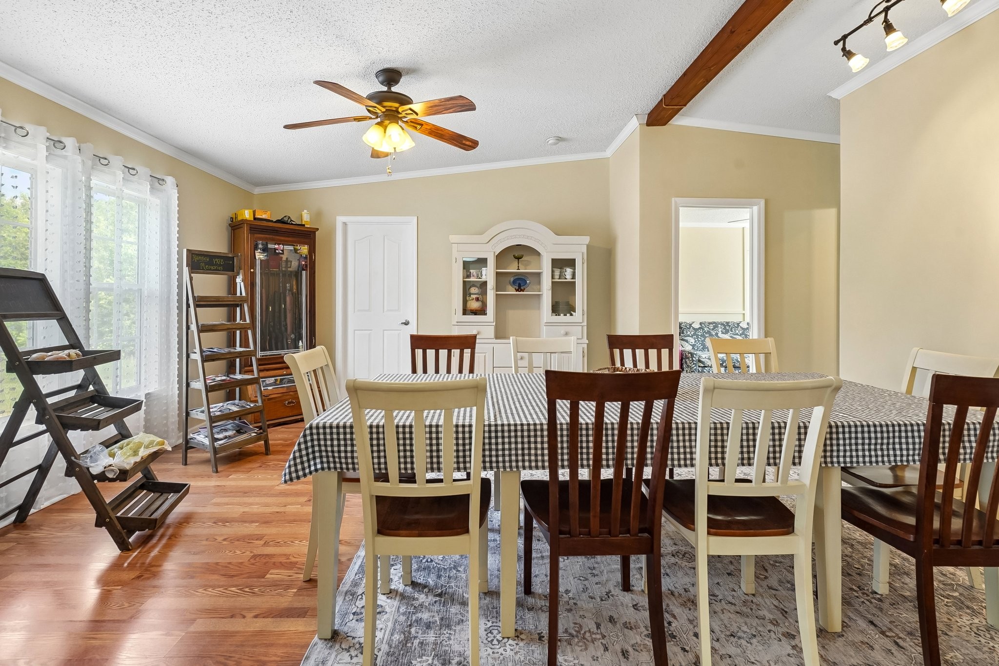 4844 Coleman Hill Road Rockvale, TN 37153 - Photo 14 of 66 a view of a livingroom with furniture a ceiling fan and wooden floor