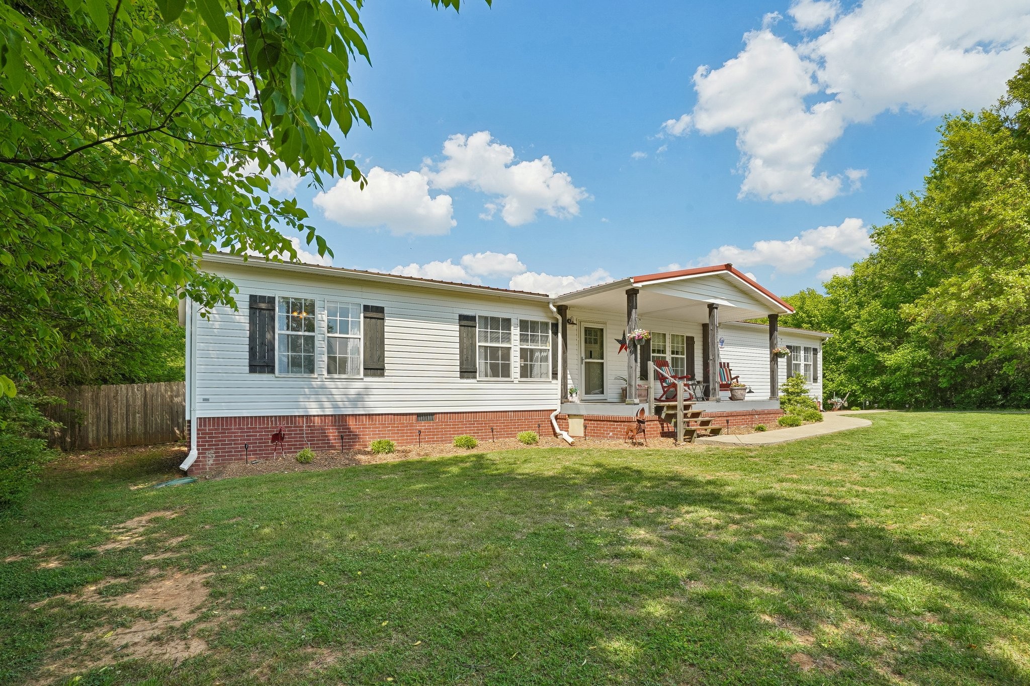 4844 Coleman Hill Road Rockvale, TN 37153 - Photo 2 of 66 a front view of house with yard and seating area