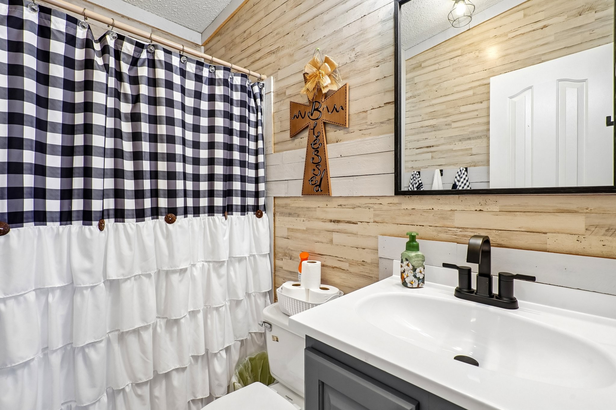 4844 Coleman Hill Road Rockvale, TN 37153 - Photo 25 of 66 a bathroom with a sink and a mirror