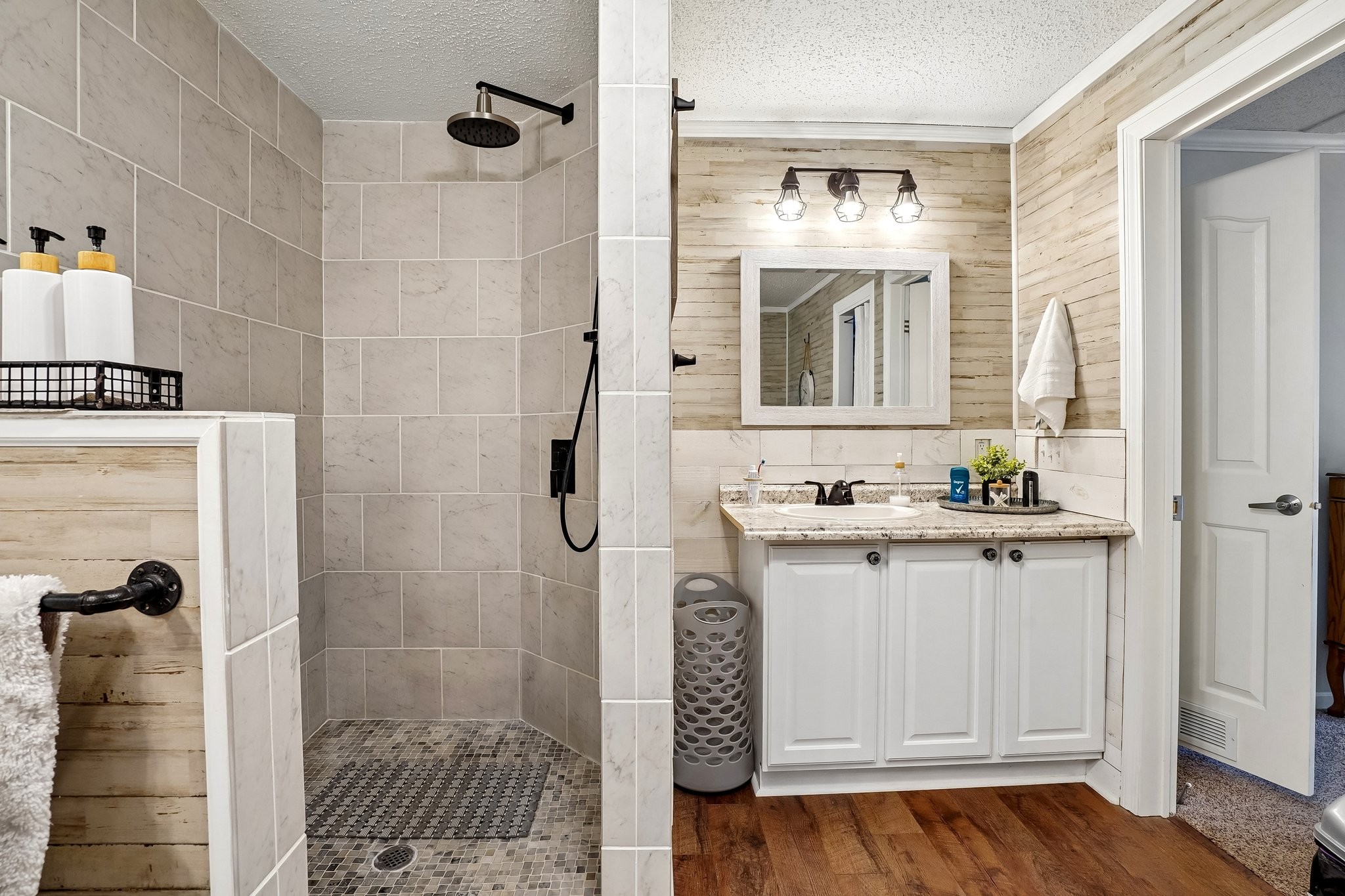 4844 Coleman Hill Road Rockvale, TN 37153 - Photo 35 of 66 a bathroom with a sink a mirror and a shower