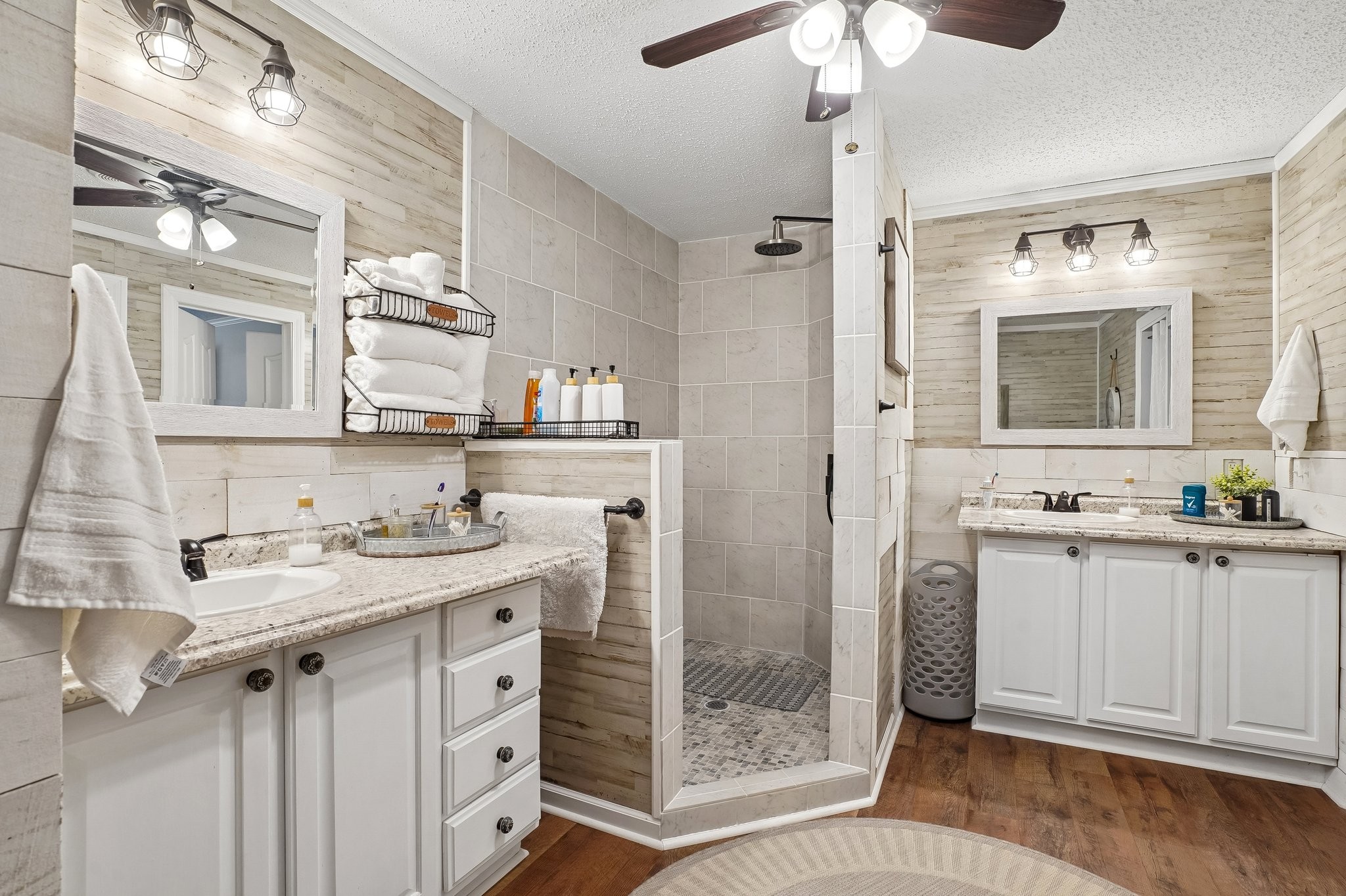 4844 Coleman Hill Road Rockvale, TN 37153 - Photo 36 of 66 a bathroom with a sink a mirror and a shower