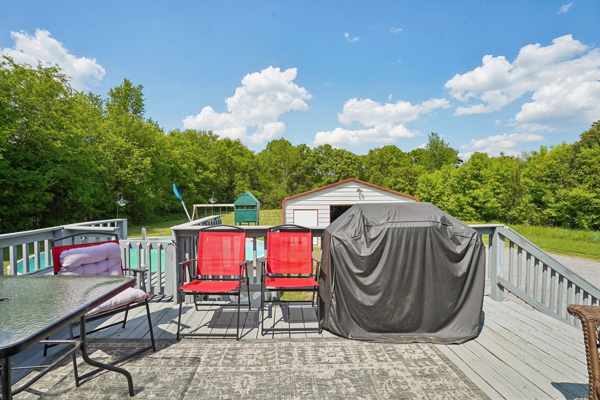 4844 Coleman Hill Road Rockvale, TN 37153 - Photo 37 of 66 a view of terrace with seating area and trees