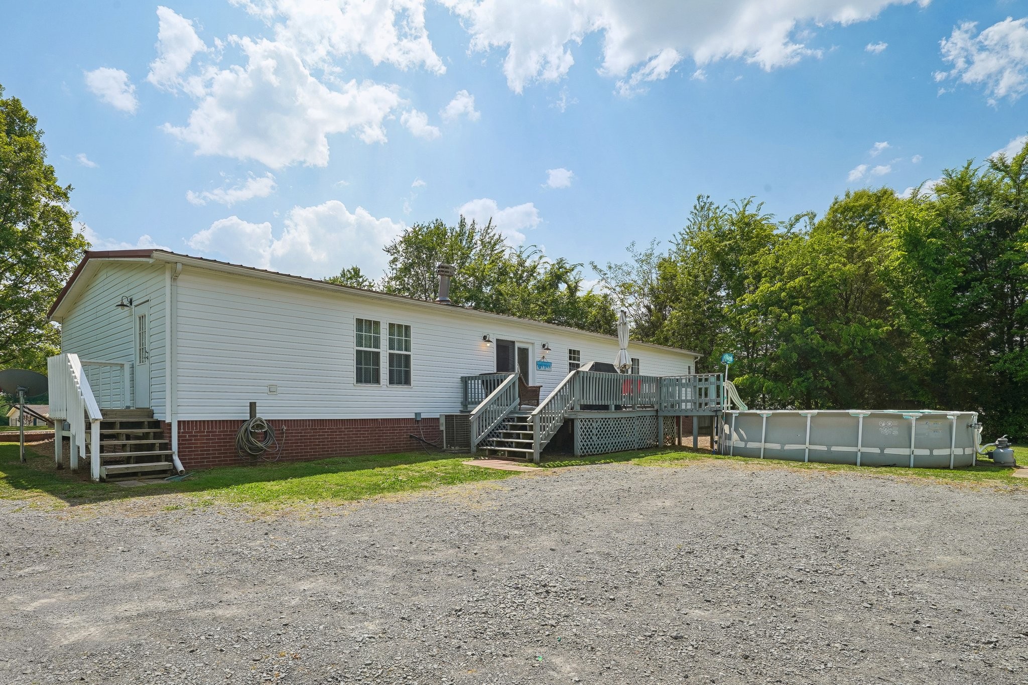 4844 Coleman Hill Road Rockvale, TN 37153 - Photo 42 of 66 a view of a backyard with a sitting area