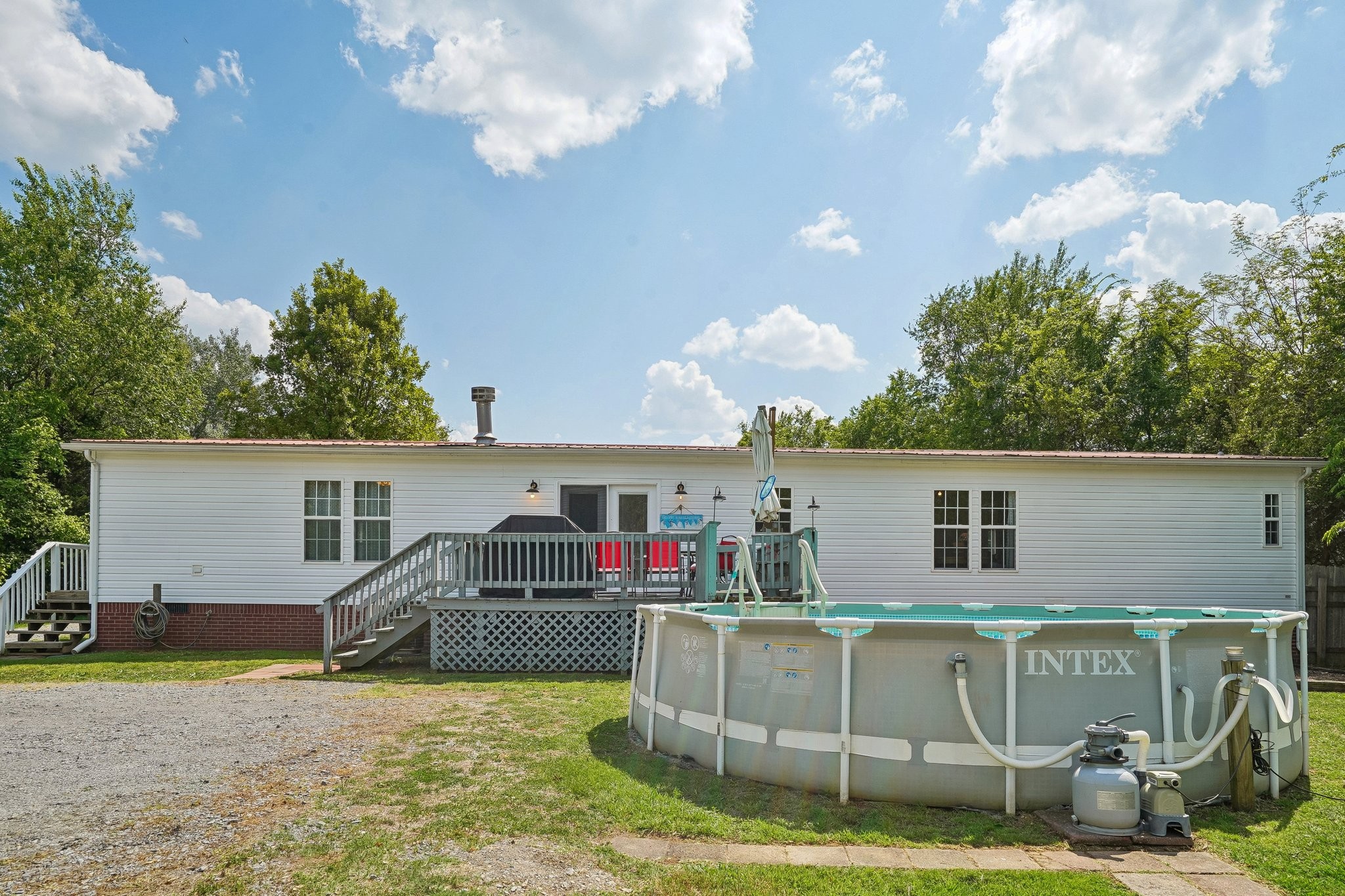 4844 Coleman Hill Road Rockvale, TN 37153 - Photo 48 of 66 a view of a house with a backyard