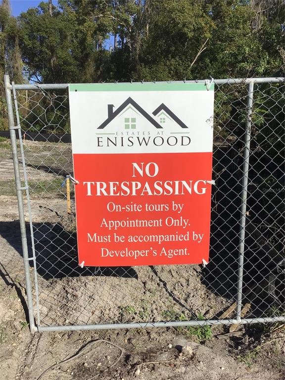 1289 Almaria Court Palm Harbor, FL 34683 - Photo 6 of 8 a sign on the side of the road