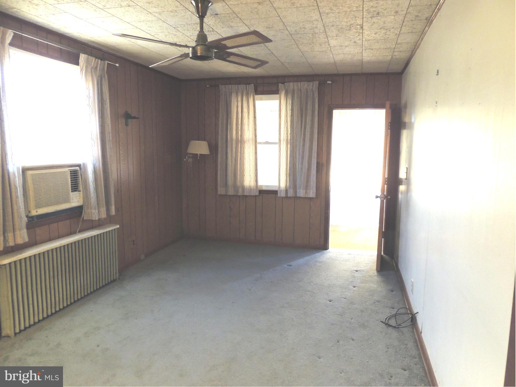 2124 Oak Road Baltimore, MD 21219 - Photo 15 of 20 a view of an empty room with a window