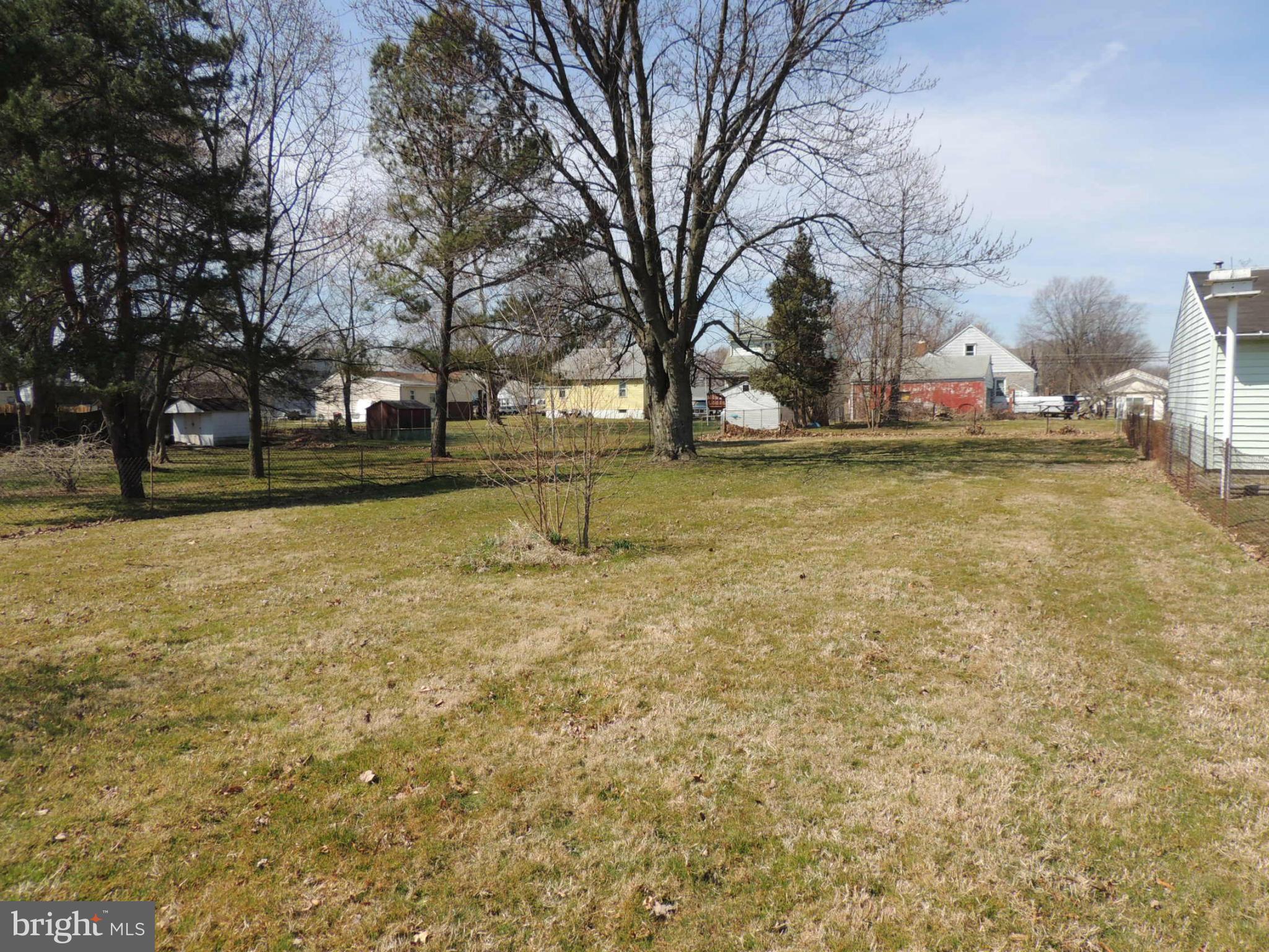 2124 Oak Road Baltimore, MD 21219 - Photo 17 of 20 a view of yard with swimming pool and trees