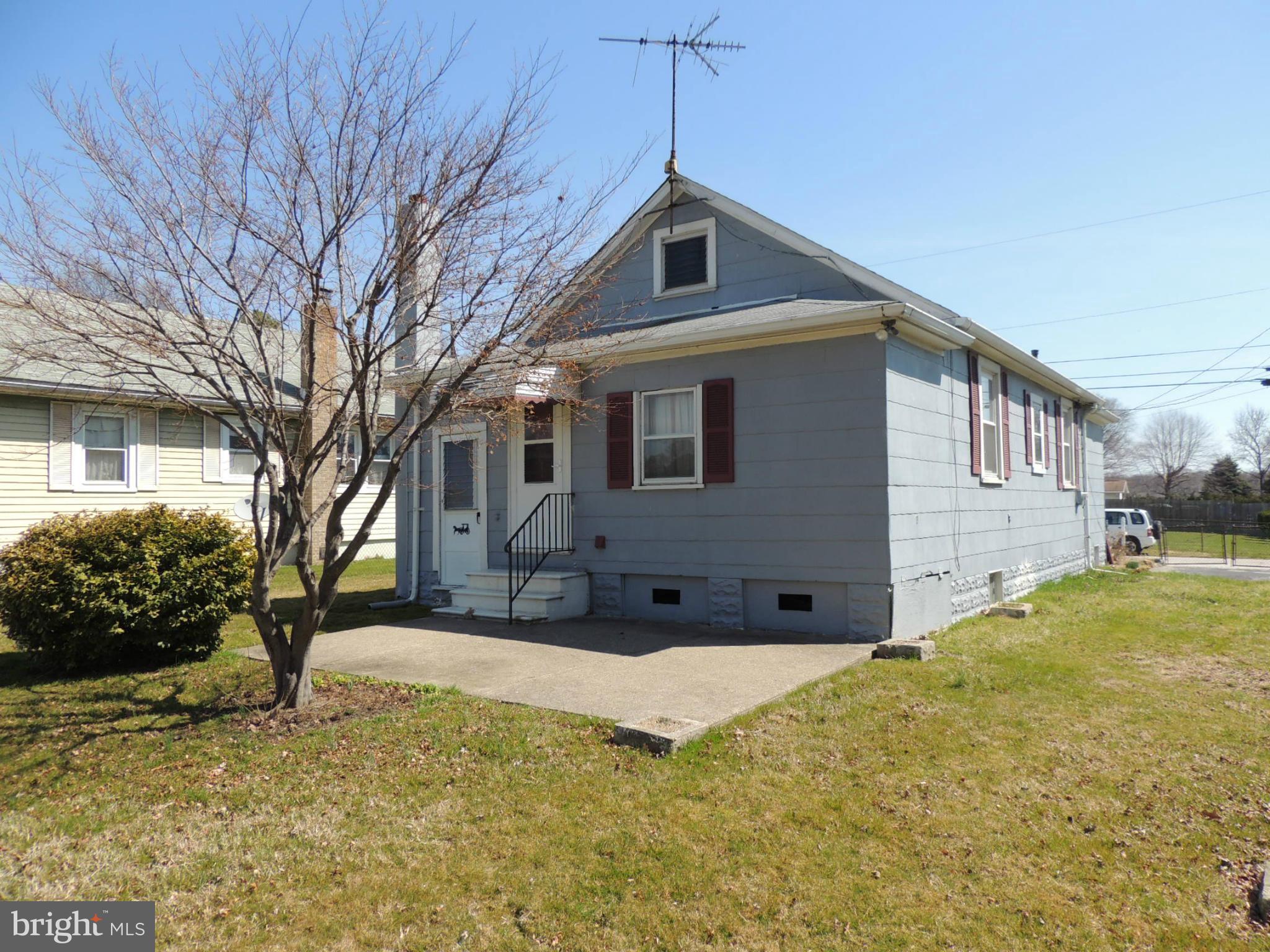 2124 Oak Road Baltimore, MD 21219 - Photo 6 of 20 a front view of a house with a yard
