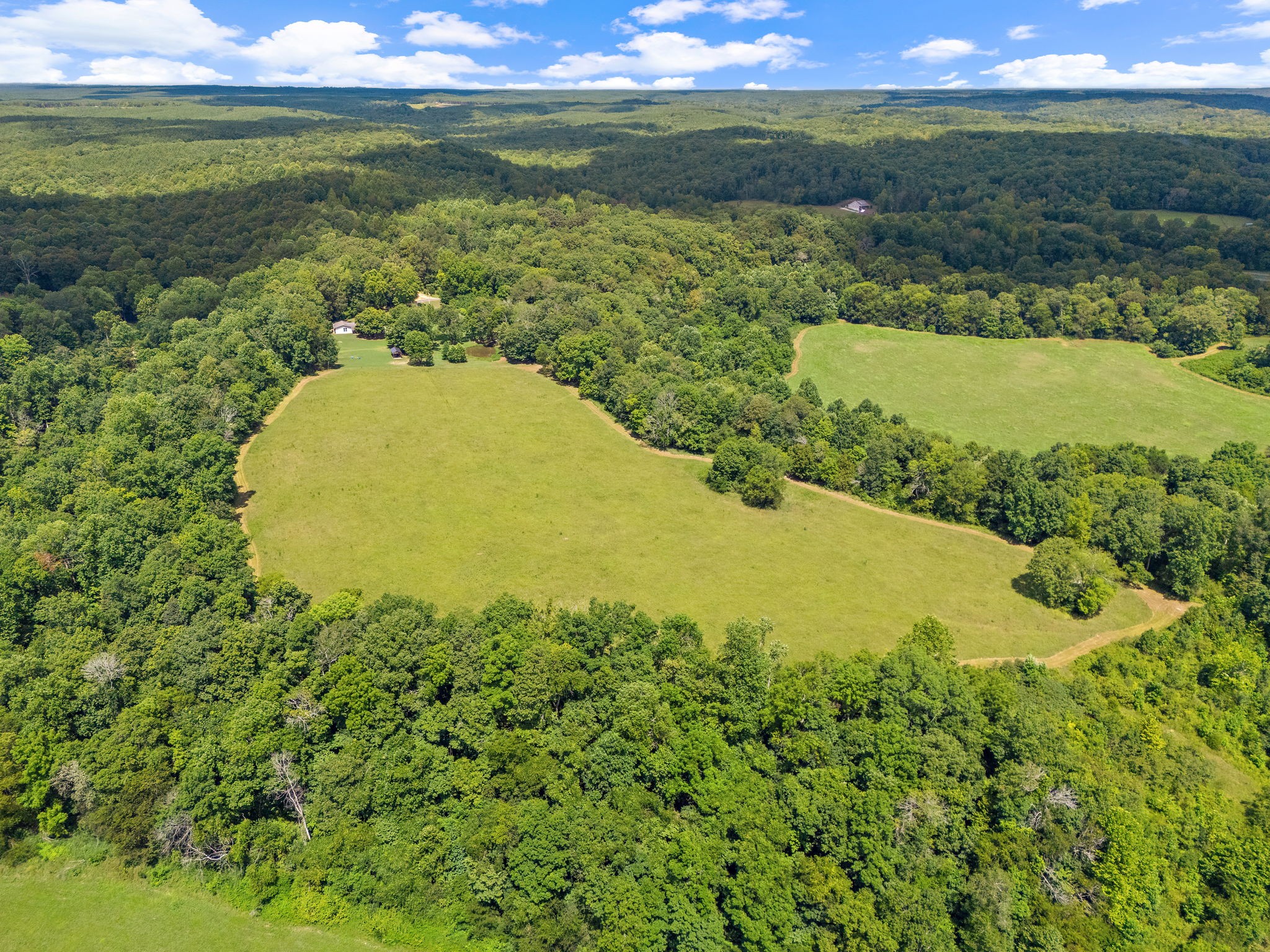 1861 Trace Creek Road Hohenwald, TN 38462 - Photo 2 of 29 a view of an ocean from a balcony