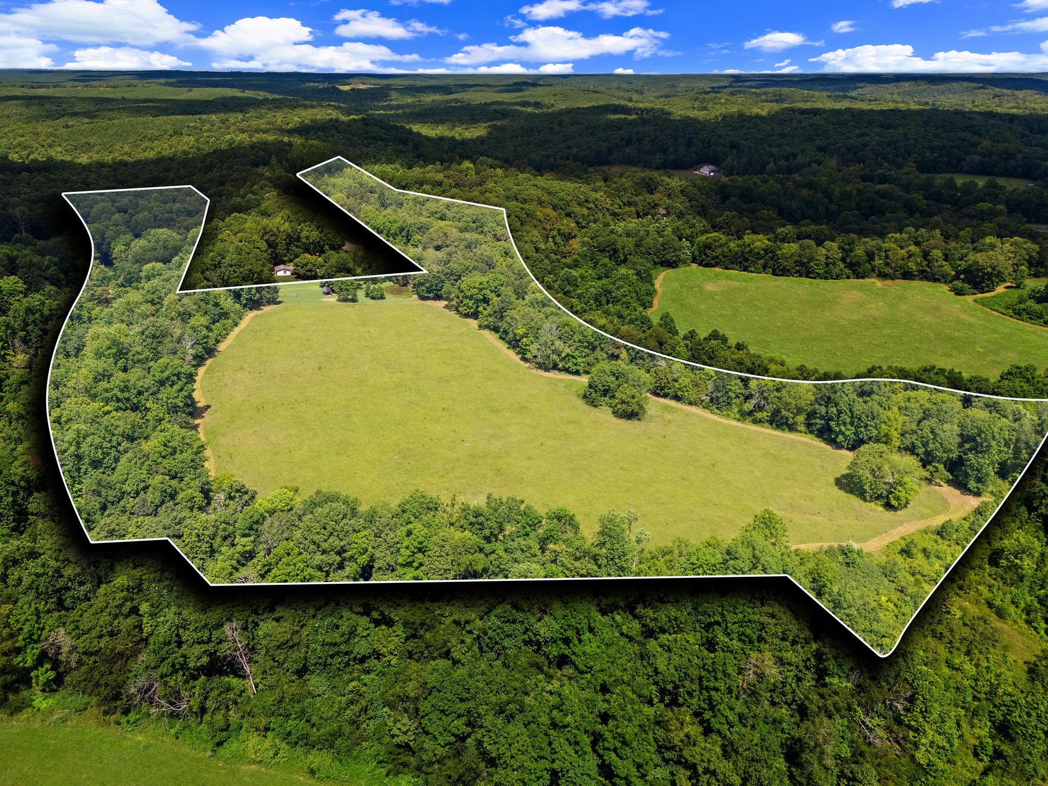 1861 Trace Creek Road Hohenwald, TN 38462 - Photo 3 of 29 a view of a swimming pool with a yard