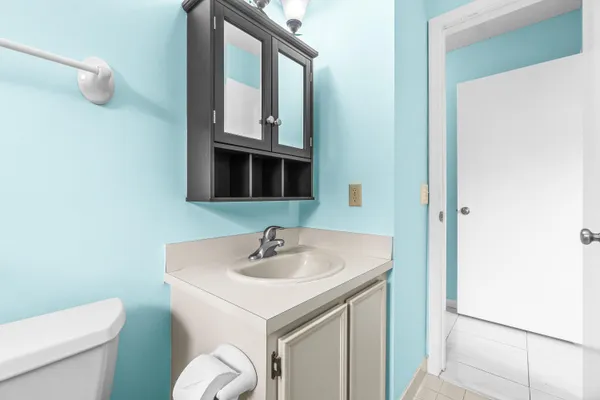 a bathroom with a sink and a toilet