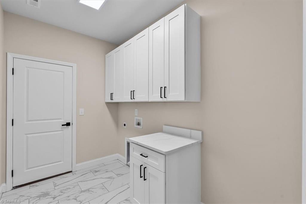 4236 Wayne Road Greensboro, NC 27407 - Photo 44 of 50 laundry room off garage