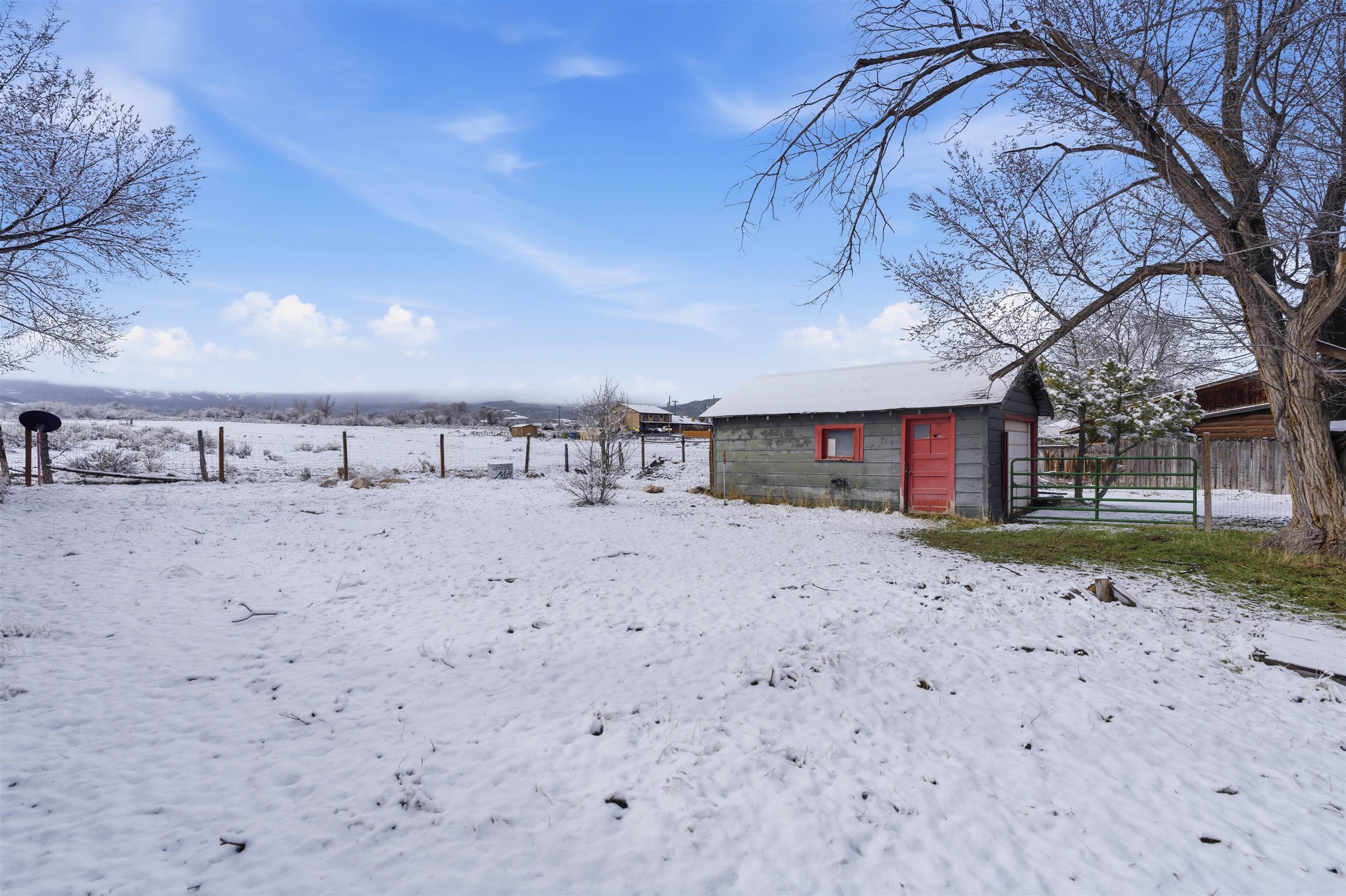 49091 KE Road Mesa, CO 81643 - Photo 11 of 29 a view of a house with a snow