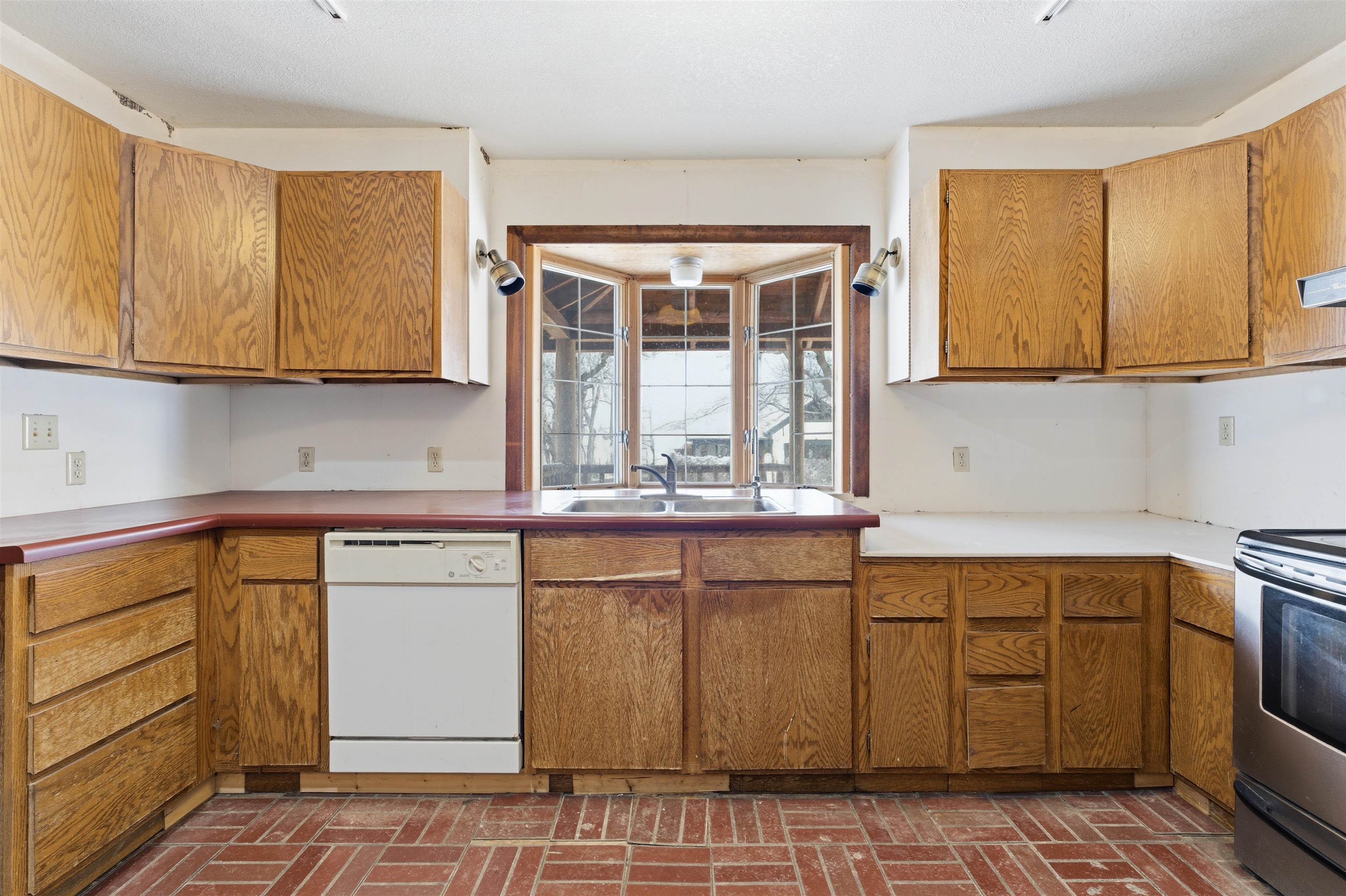 49091 KE Road Mesa, CO 81643 - Photo 25 of 29 a kitchen with a sink cabinets and window